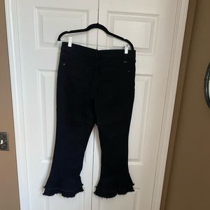 Double ruffles on bottom. INC Black jeans.